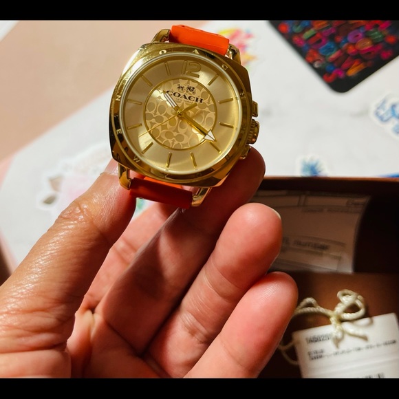 coach boyfriend watch gold